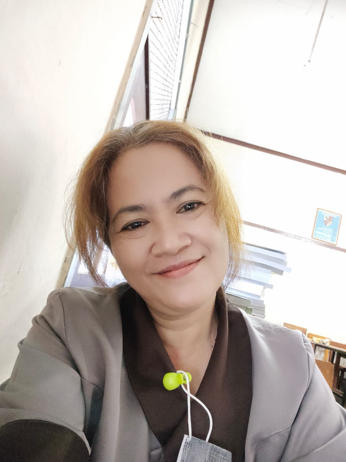 Hartini, A.Md